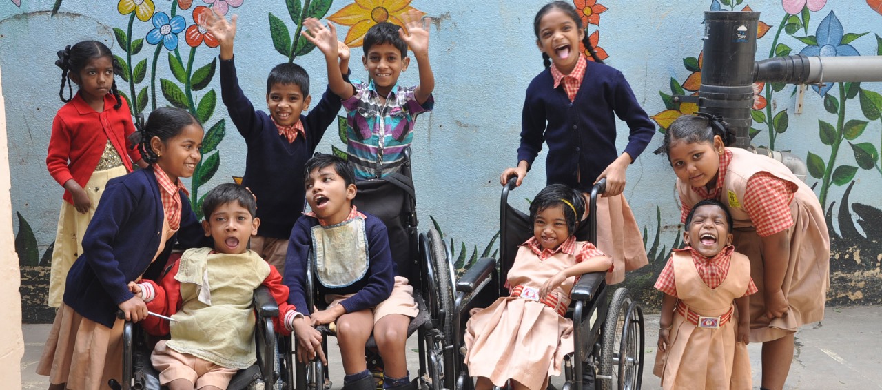 Happy children supported by the NGO